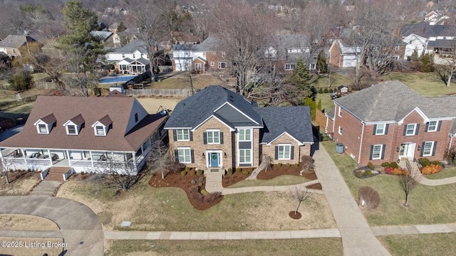 drone / aerial view with a residential view