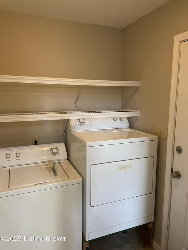 laundry area featuring laundry area and washing machine and clothes dryer