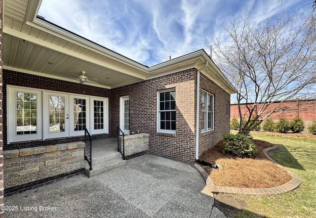 view of patio with a ceiling fan and french doors