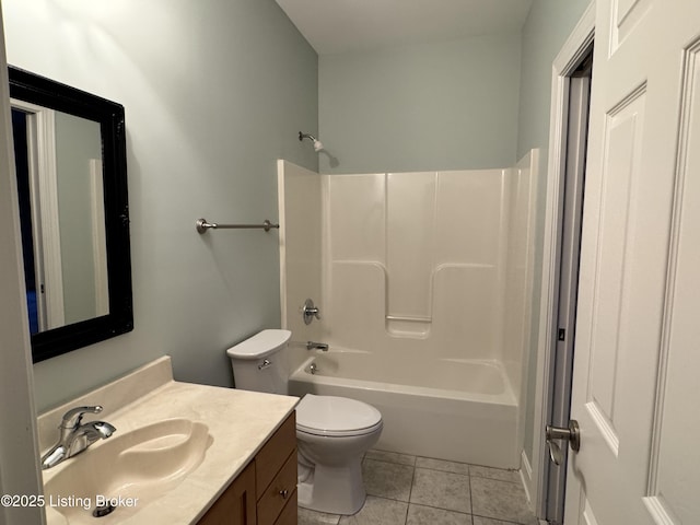 bathroom with vanity, toilet, tub / shower combination, and tile patterned flooring