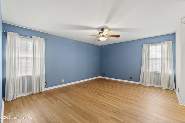 3004 Brownsboro Vista Dr, Louisville, KY 40242 - spare room with wood finished floors, baseboards, and ceiling fan