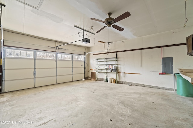 3004 Brownsboro Vista Dr, Louisville, KY 40242 - garage featuring electric panel, a garage door opener, and a ceiling fan