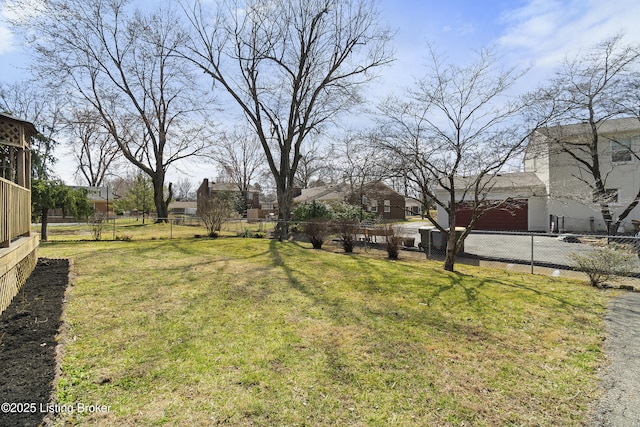 3004 Brownsboro Vista Dr, Louisville, KY 40242 - view of yard with driveway, an attached garage, and fence