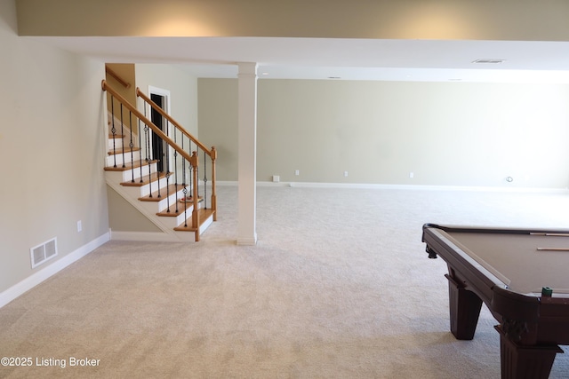 recreation room with carpet floors, visible vents, and baseboards