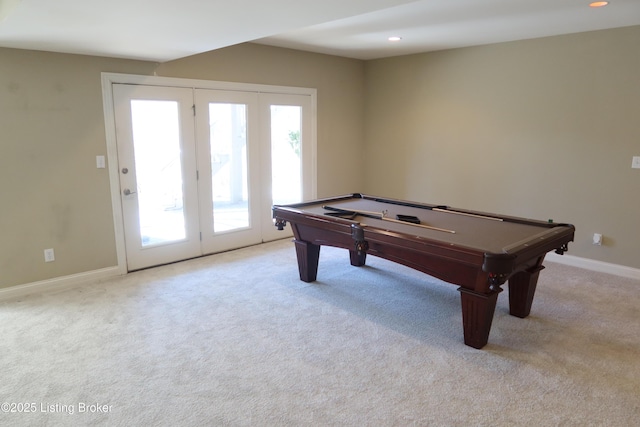 rec room featuring recessed lighting, a healthy amount of sunlight, and light carpet