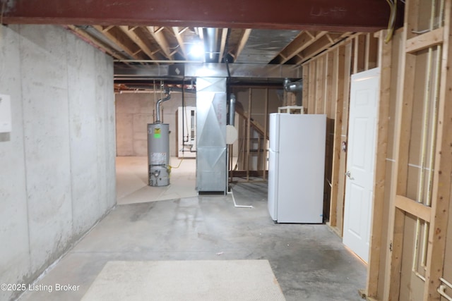 unfinished below grade area with freestanding refrigerator and water heater