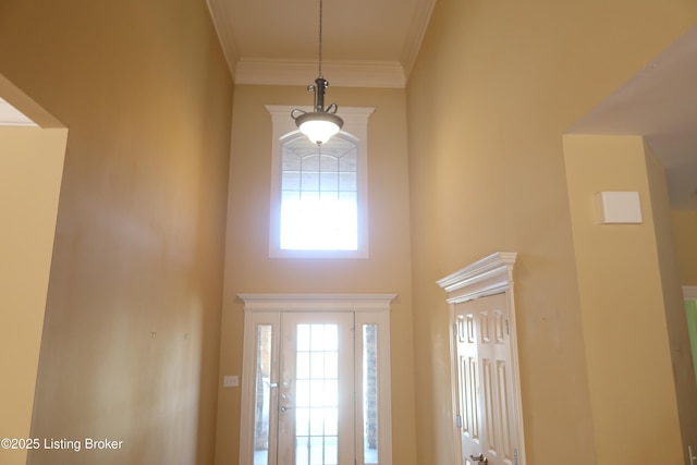 foyer entrance with crown molding