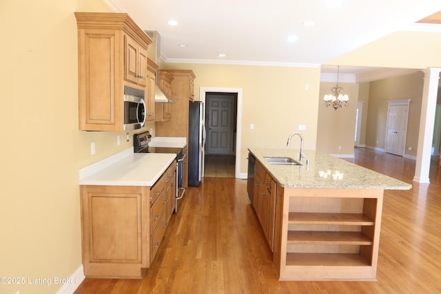 kitchen featuring crown molding, light wood finished floors, open shelves, stainless steel appliances, and a sink