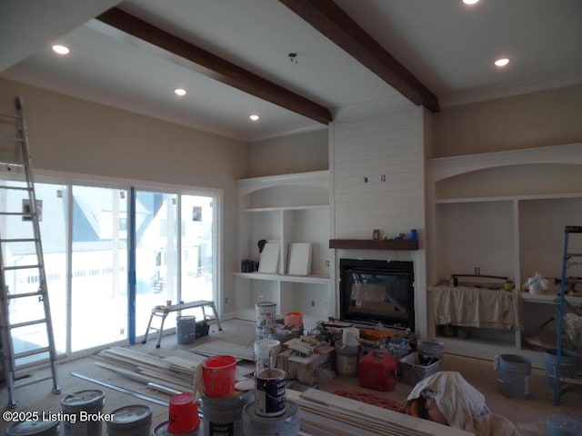 living area with a glass covered fireplace, beam ceiling, and recessed lighting