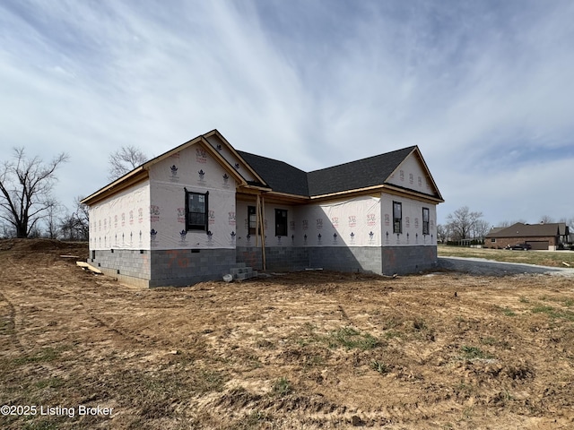 view of front of home featuring crawl space