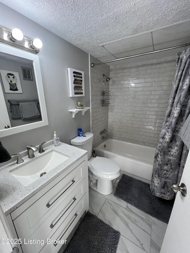 full bathroom with marble finish floor, visible vents, shower / bathtub combination with curtain, toilet, and a textured ceiling