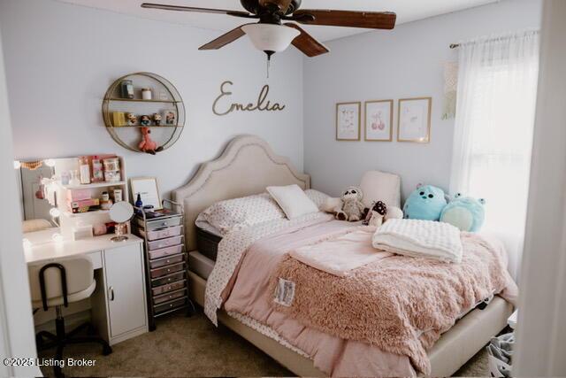 carpeted bedroom with ceiling fan