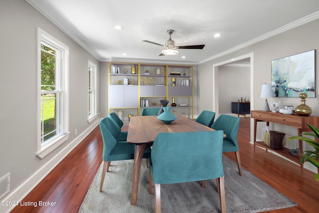 dining area featuring ornamental molding, recessed lighting, hardwood / wood-style flooring, and baseboards