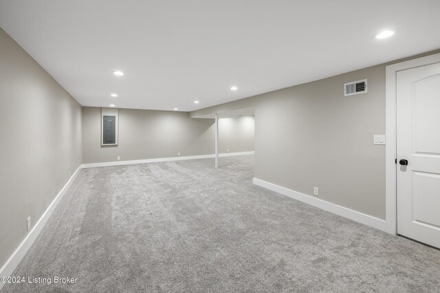 finished basement with recessed lighting, visible vents, and baseboards