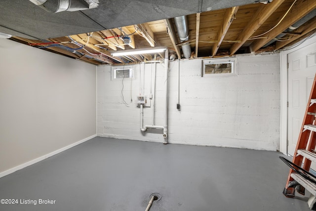 unfinished basement with baseboards