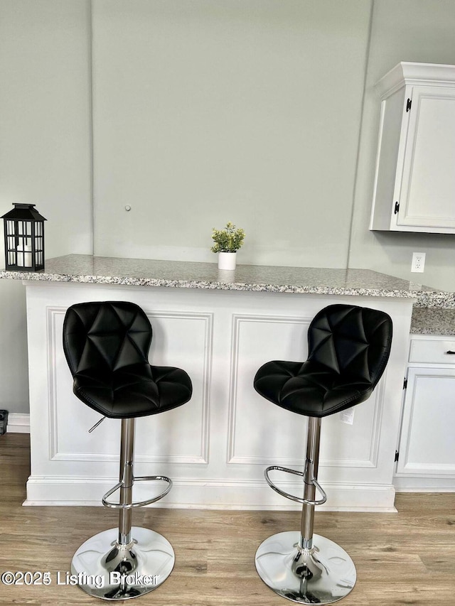 interior details featuring wood finished floors