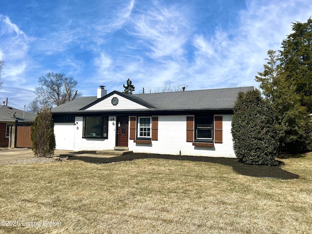 single story home with roof with shingles, a front lawn, and a chimney