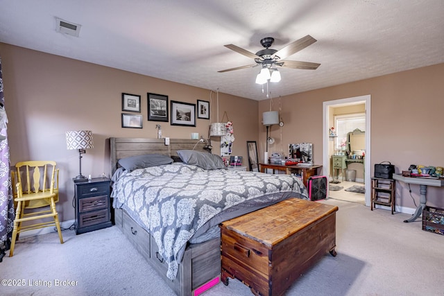 bedroom featuring light carpet, baseboards, visible vents, ceiling fan, and a textured ceiling