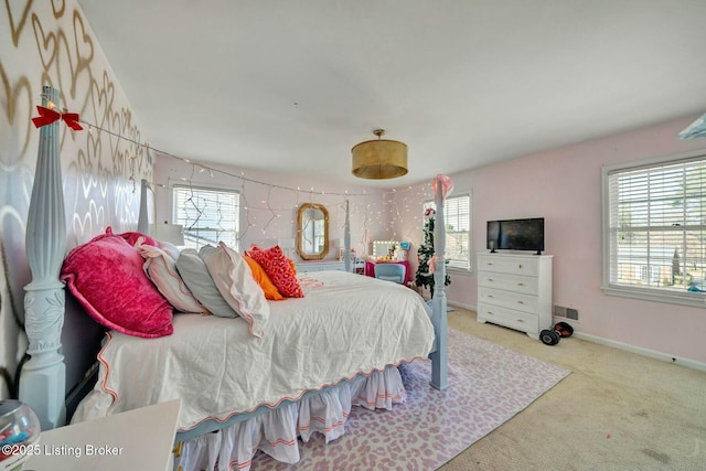 bedroom featuring carpet floors, baseboards, and visible vents