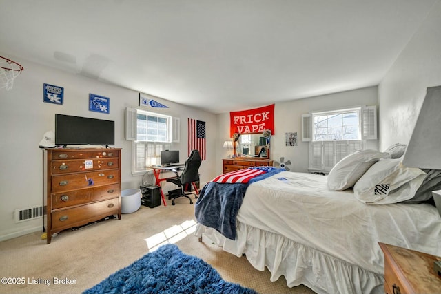 carpeted bedroom with visible vents