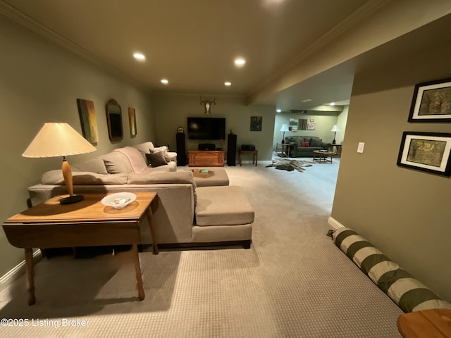 carpeted living area featuring baseboards, crown molding, and recessed lighting