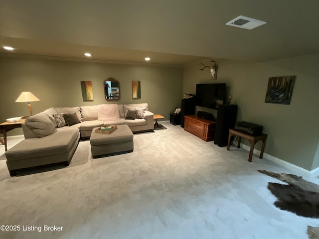 living room featuring carpet floors, baseboards, visible vents, and recessed lighting