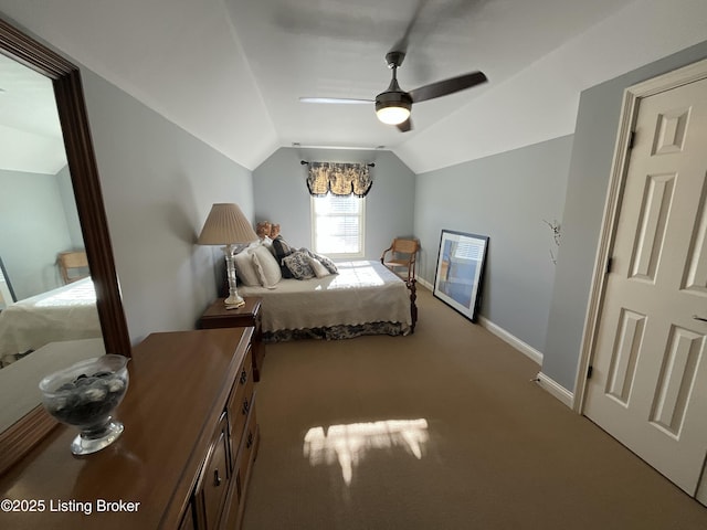 carpeted bedroom with lofted ceiling, ceiling fan, and baseboards