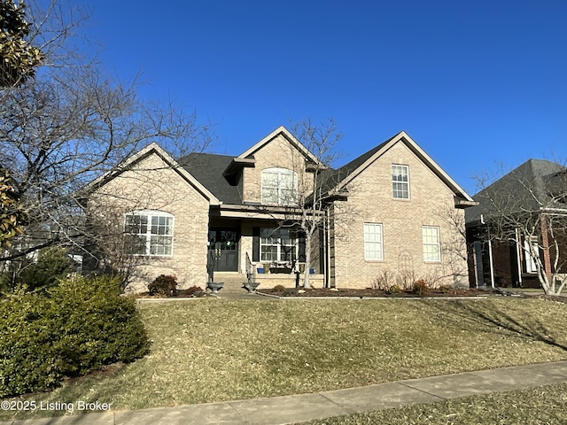 traditional home featuring brick siding