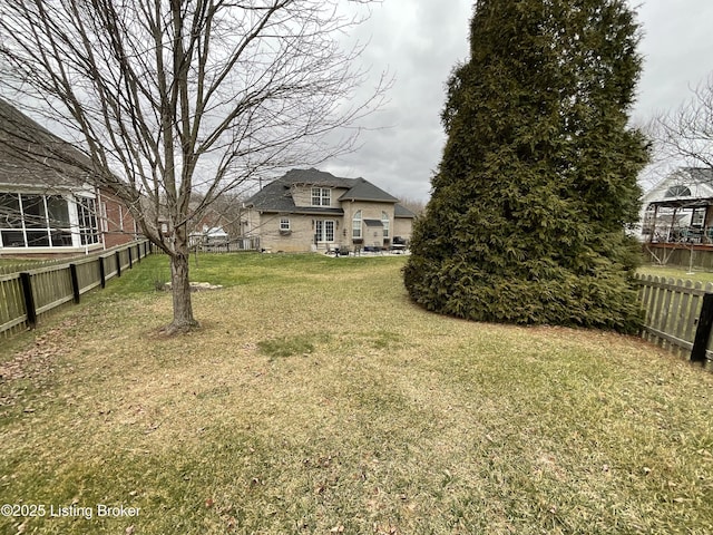 view of yard with fence