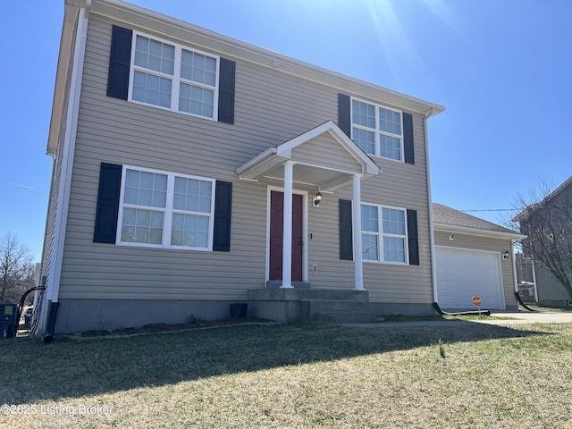 view of front facade featuring a garage and a front lawn