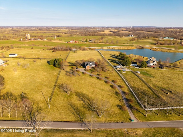 aerial view with a rural view and a water view