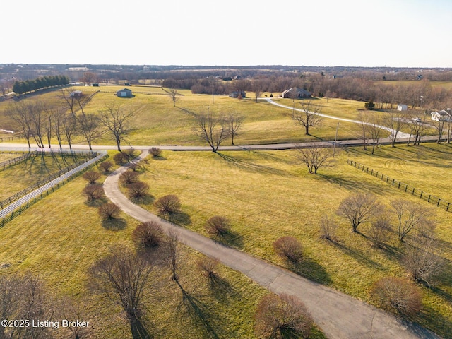 birds eye view of property featuring a rural view