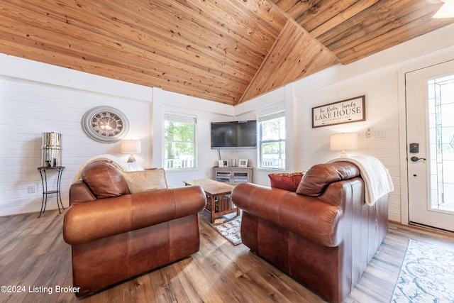 living area featuring wood ceiling, vaulted ceiling, and wood finished floors