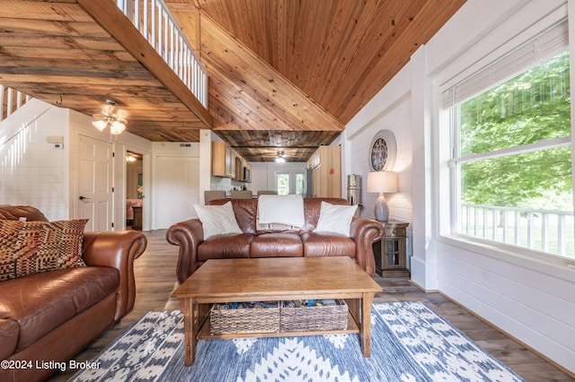 living room with lofted ceiling, wooden ceiling, and wood finished floors