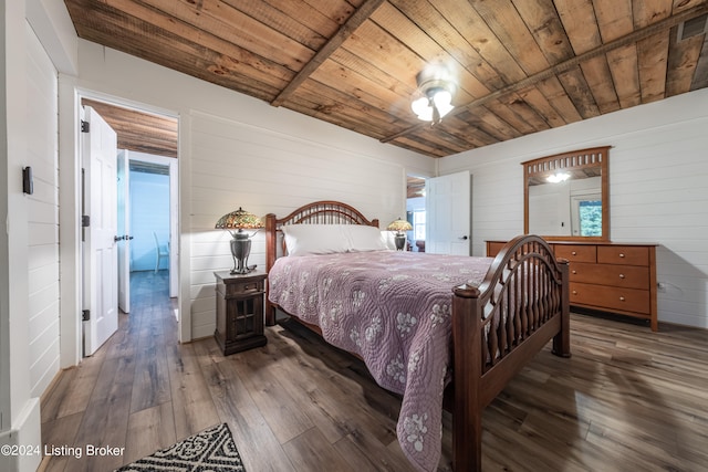 bedroom featuring wood ceiling and dark wood-type flooring