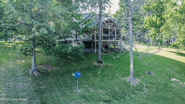 view of yard with a deck