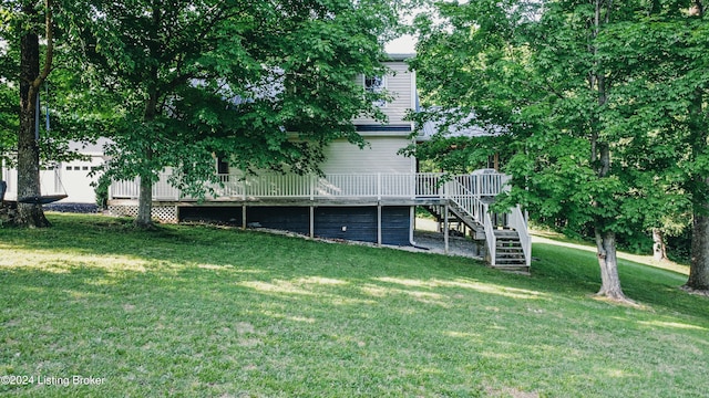 view of yard with stairs and a wooden deck