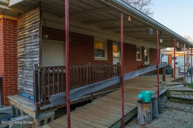 view of home's exterior featuring brick siding