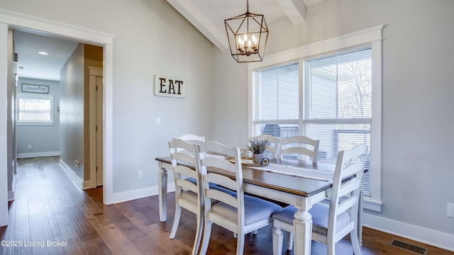 dining area featuring visible vents, baseboards, beam ceiling, dark wood-style floors, and an inviting chandelier