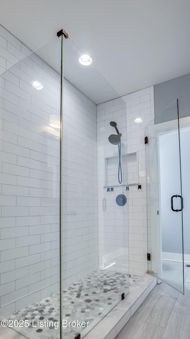 bathroom featuring a stall shower