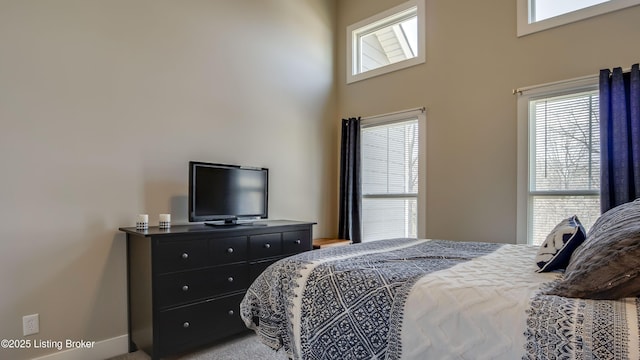 bedroom with a towering ceiling