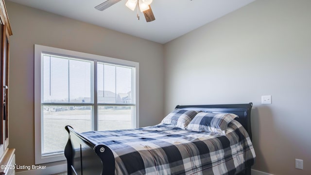 bedroom featuring ceiling fan