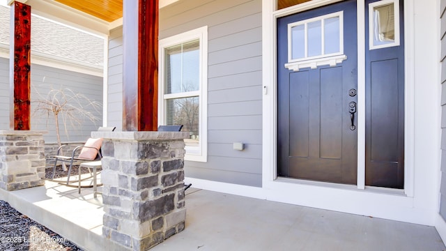 entrance to property with covered porch