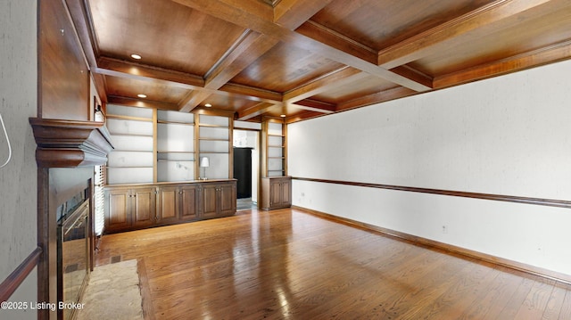 interior space with coffered ceiling, wood ceiling, baseboards, light wood-type flooring, and beamed ceiling