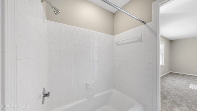 bathroom with shower / bath combination