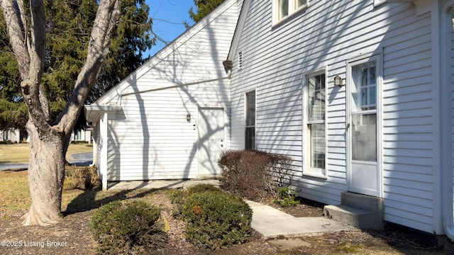 view of property exterior with entry steps