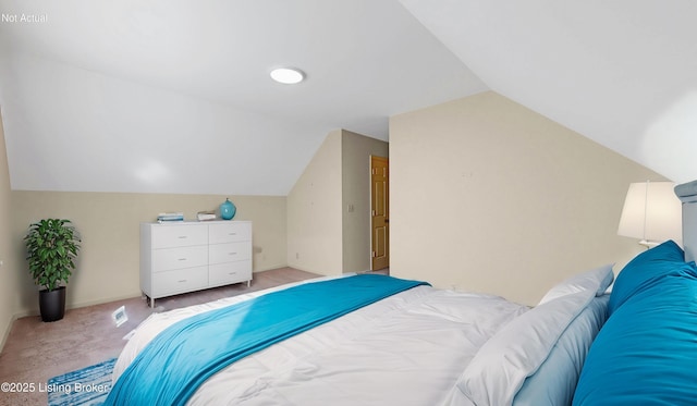 bedroom featuring carpet floors, vaulted ceiling, and baseboards