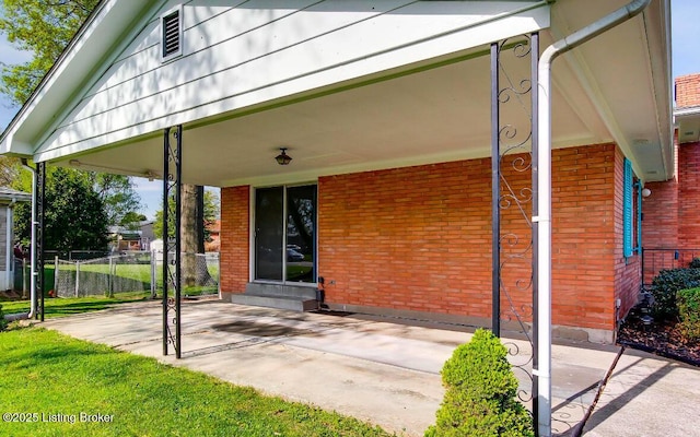 view of patio / terrace featuring fence