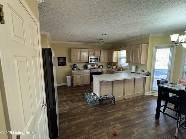 kitchen featuring dark wood-style flooring, a peninsula, stainless steel appliances, light brown cabinetry, and a sink