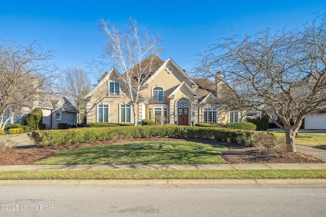 view of front of house featuring a front yard